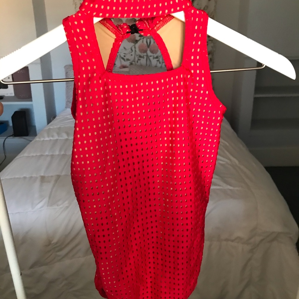 red leotard with detailing and cut out neck